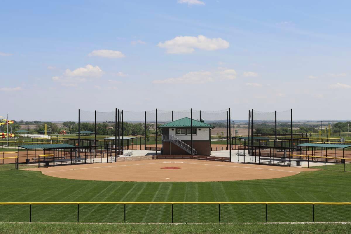Baseball field netting and chain link fence with padding