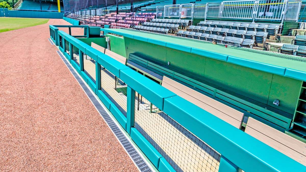 Custom dugout with impact padding and netting