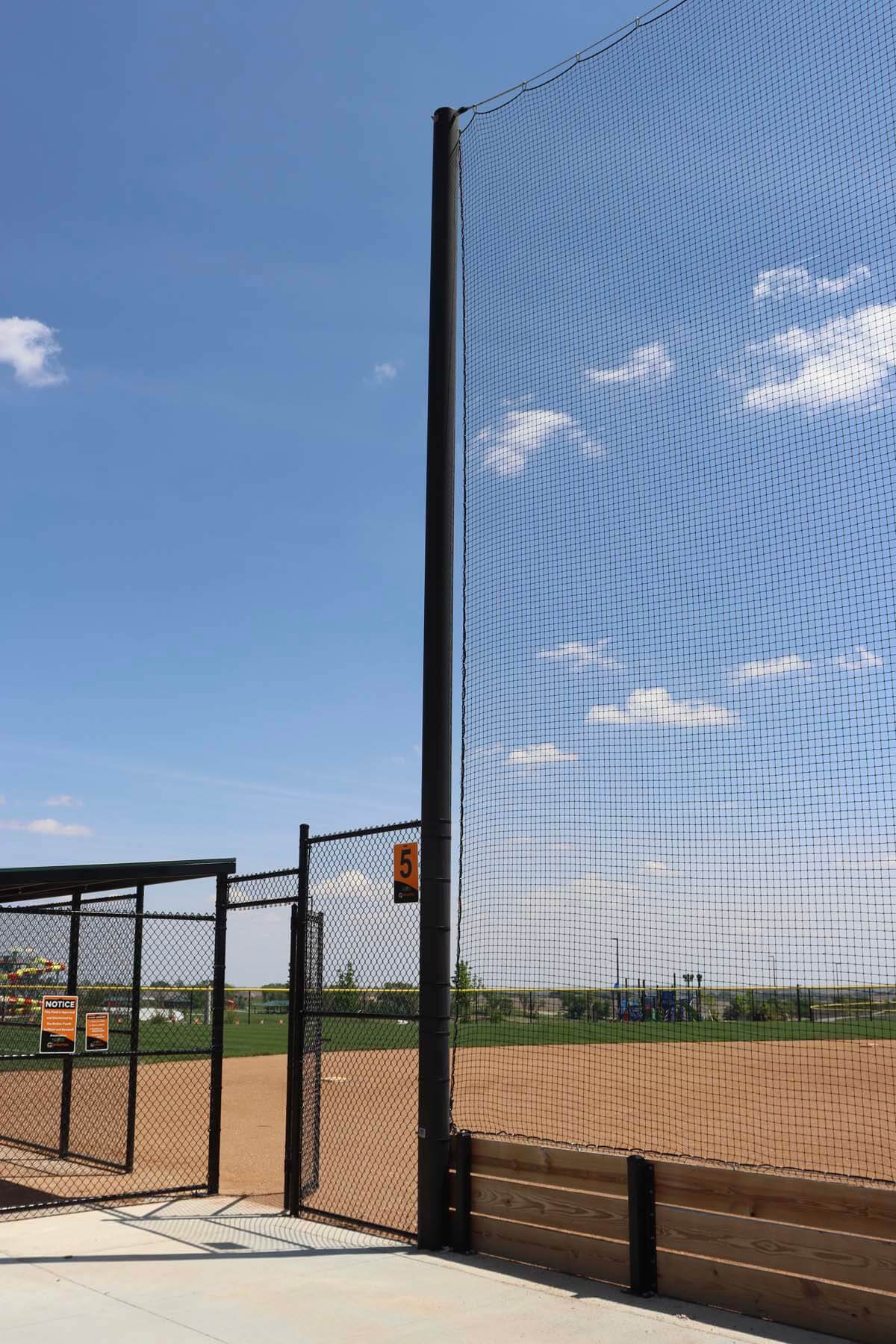 Baseball field netting and fence installed by Empire Netting