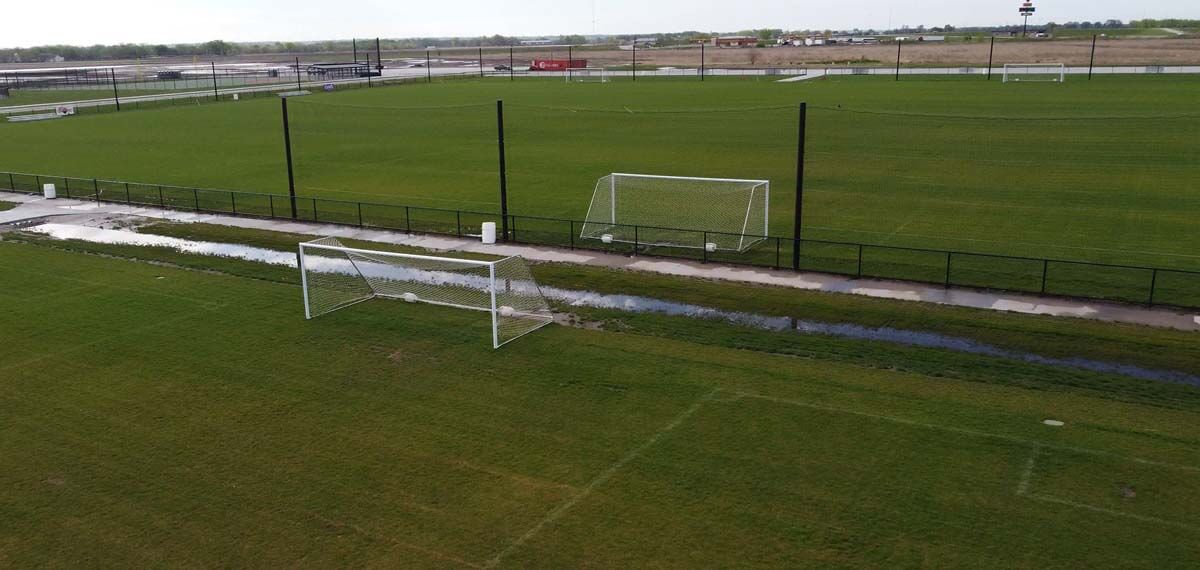 Soccer field netting and fence installed by Empire Netting