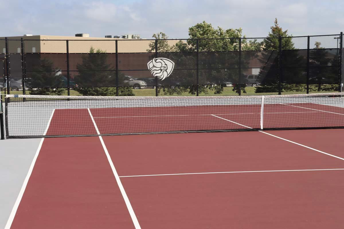 Custom graphic for chain link fence at the tennis court